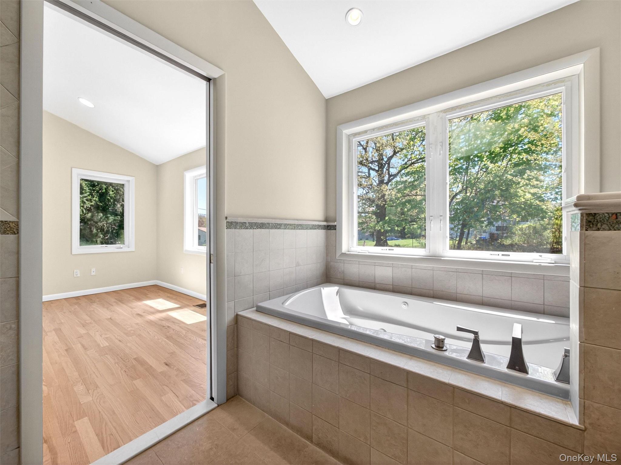 19 Buckingham Road Nanuet, NY 10954 - Photo 18 of 39 Private bath with soaking tub, perfect for relaxing at the end of the day.