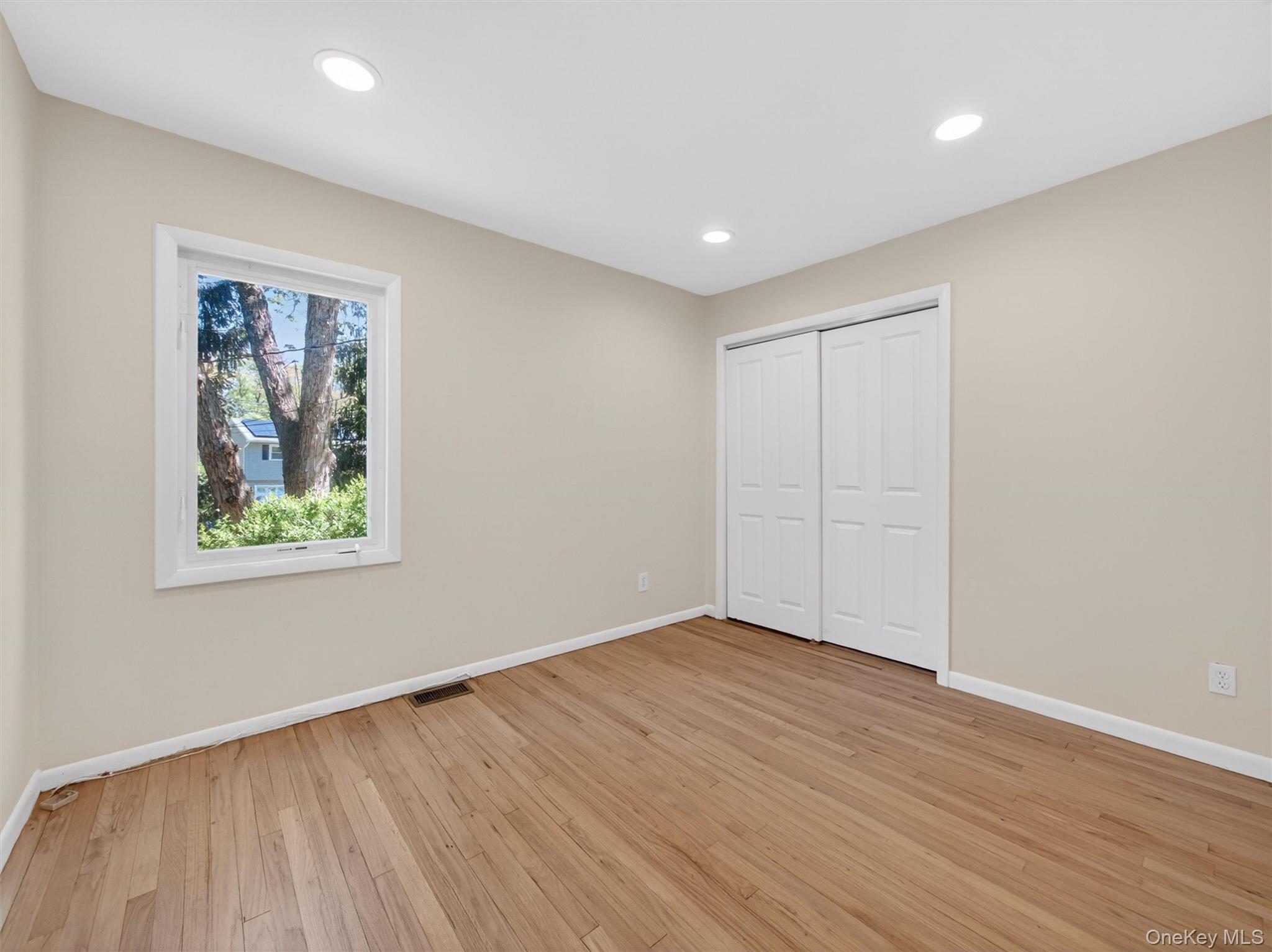19 Buckingham Road Nanuet, NY 10954 - Photo 22 of 39 Bedroom 3: Bright and comfortable bedroom with hardwood floors and an open, inviting feel.