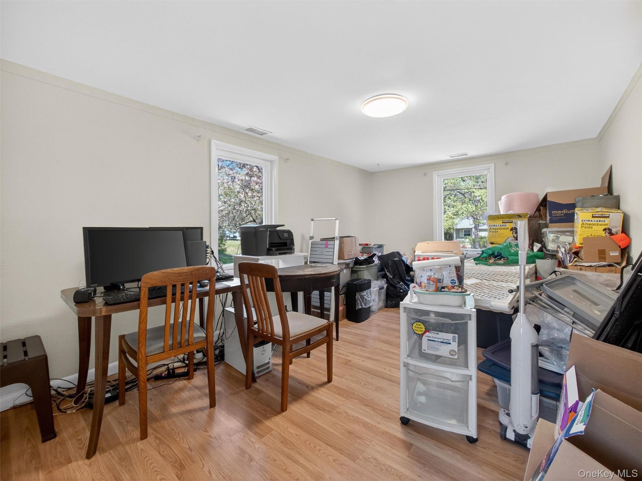 19 Buckingham Road Nanuet, NY 10954 - Photo 25 of 39 5th bedroom or ideal for a home office, guest area, or multipurpose use, complete with its own half bath and set apart from the main living areas for added privacy.