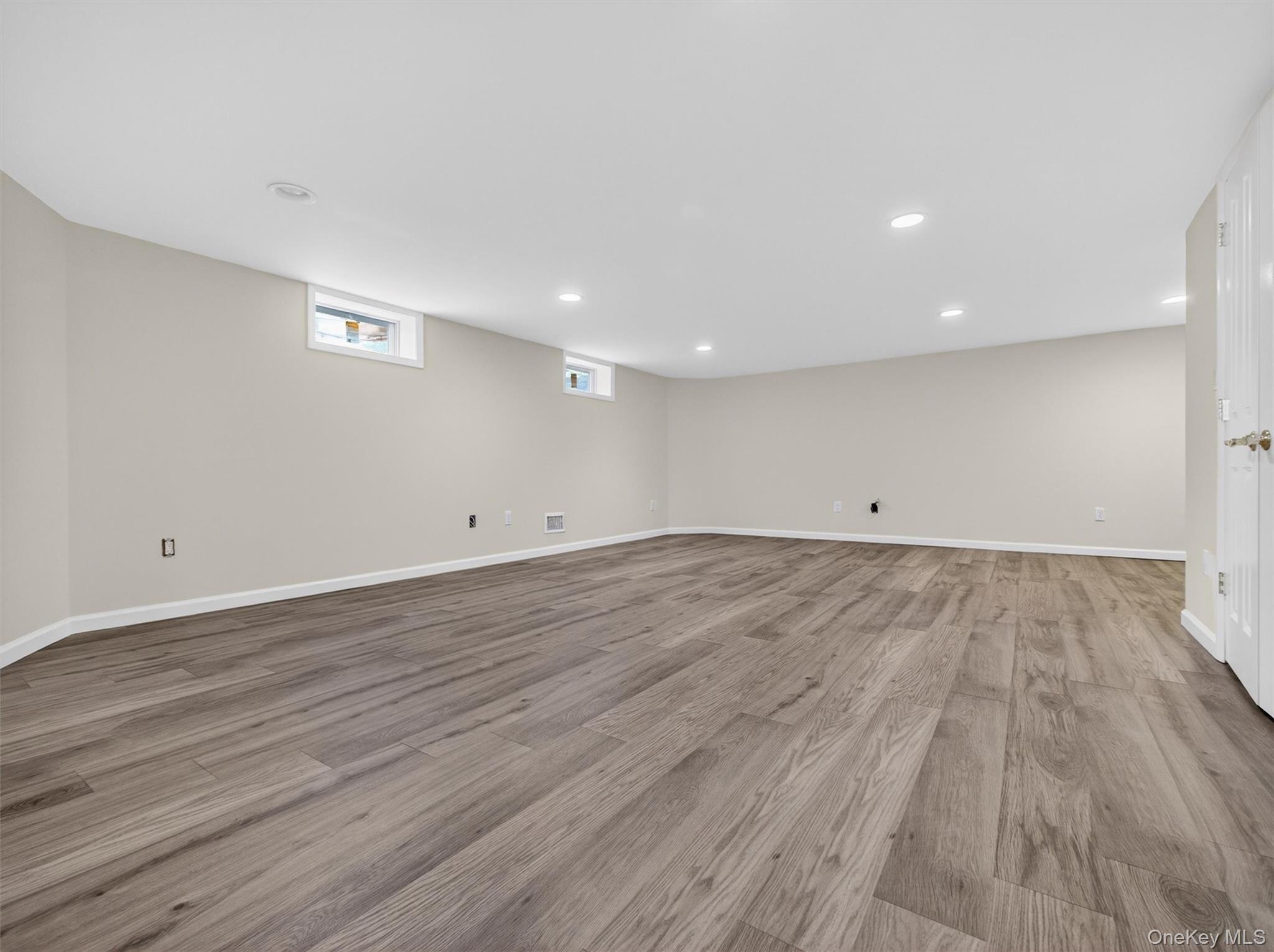 19 Buckingham Road Nanuet, NY 10954 - Photo 28 of 39 Bright and versatile space with a spacious layout, ideal for a media room, recreation area, or extended living.