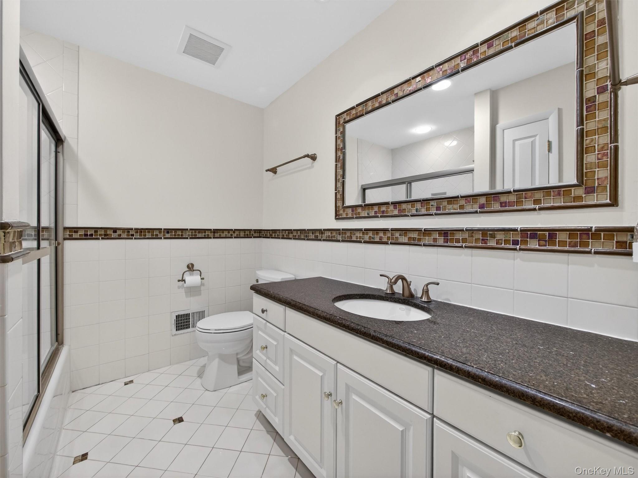 19 Buckingham Road Nanuet, NY 10954 - Photo 30 of 39 Lower level bathroom: Full bathroom conveniently located on the lower level, ideal for guests or added functionality of the finished space.