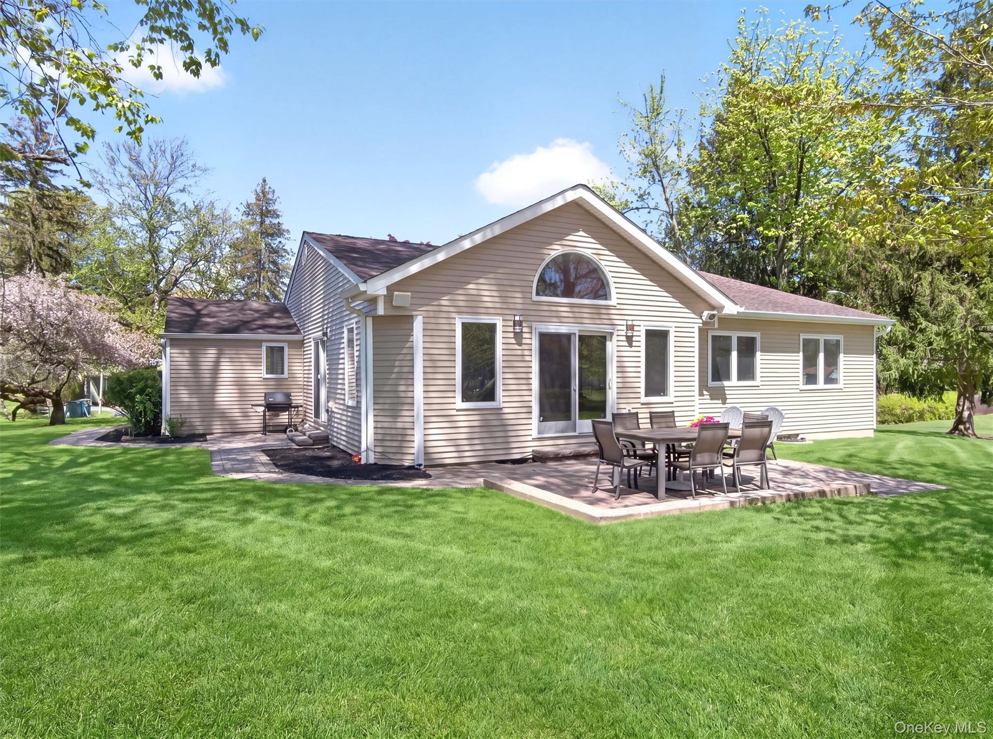 19 Buckingham Road Nanuet, NY 10954 - Photo 34 of 39 Expansive patio just off the great room, creating a seamless indoor-outdoor flow and plenty of space to entertain.