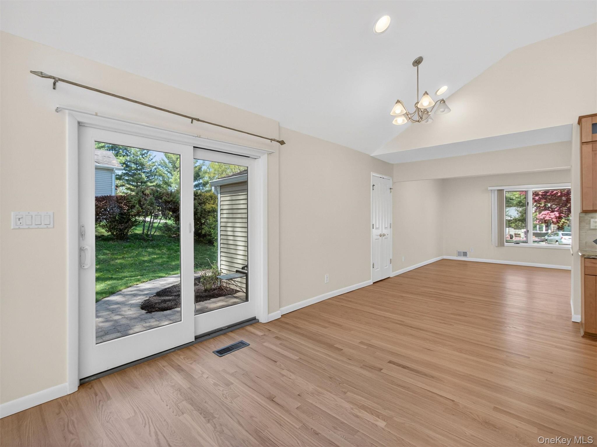 19 Buckingham Road Nanuet, NY 10954 - Photo 8 of 39 Dining space with sliding glass doors providing easy access to the outdoors, offering a great flow for indoor-outdoor living and entertaining.