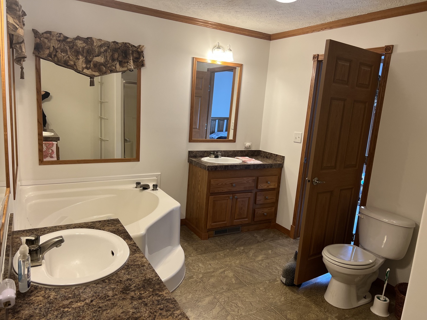 405 James Road Elwood, IL 60421 - Photo 15 of 27 a bathroom with a sink toilet and shower