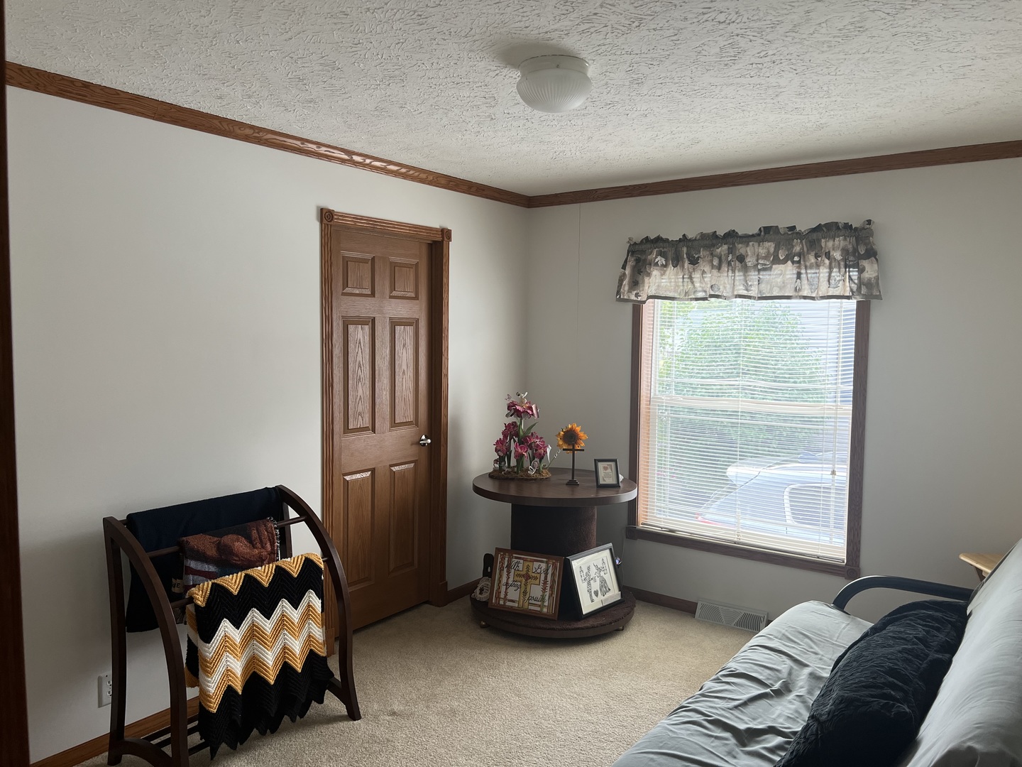 405 James Road Elwood, IL 60421 - Photo 17 of 27 a bedroom with furniture and a chair
