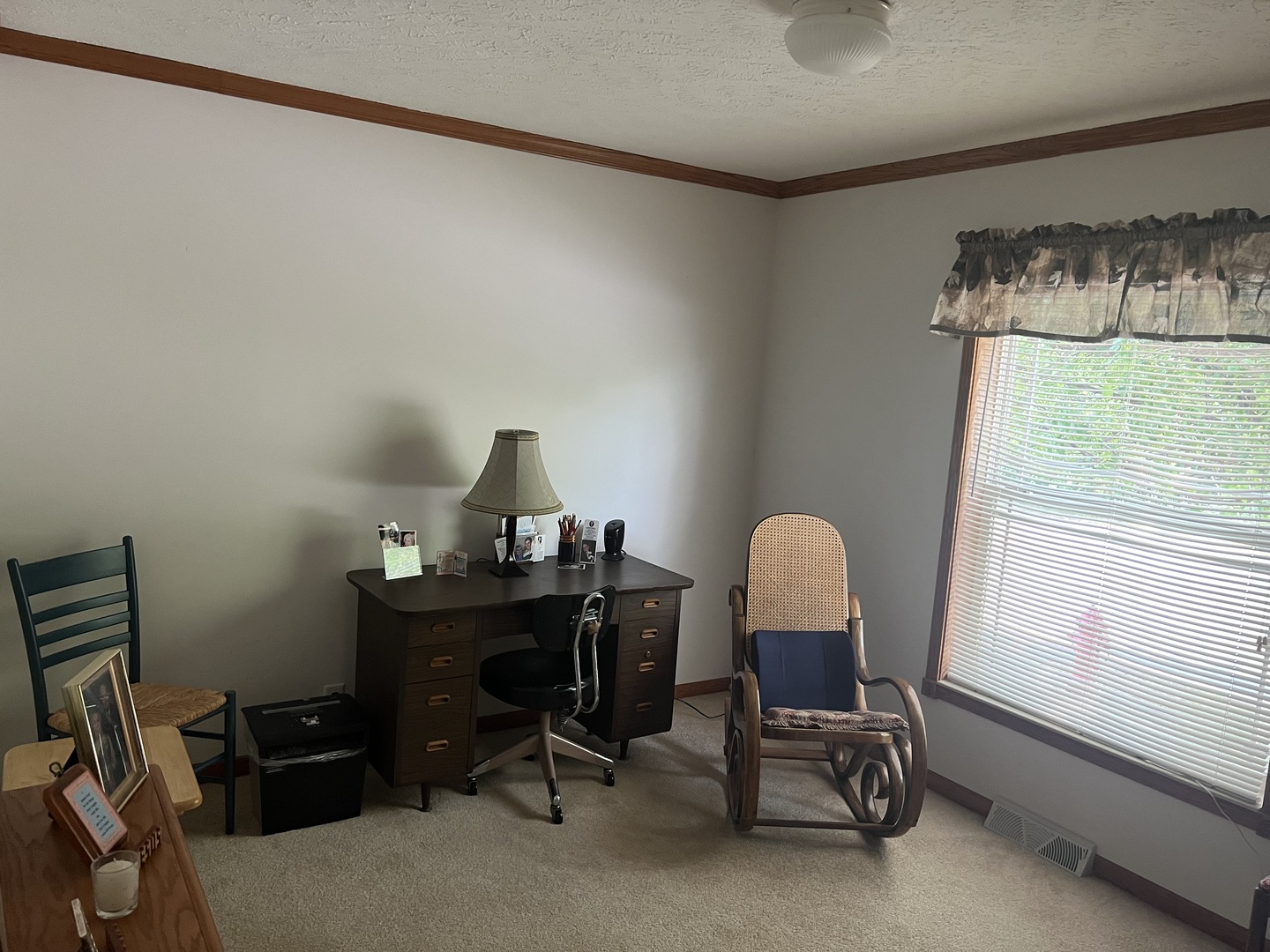 405 James Road Elwood, IL 60421 - Photo 18 of 27 a view of a workspace with furniture and a window