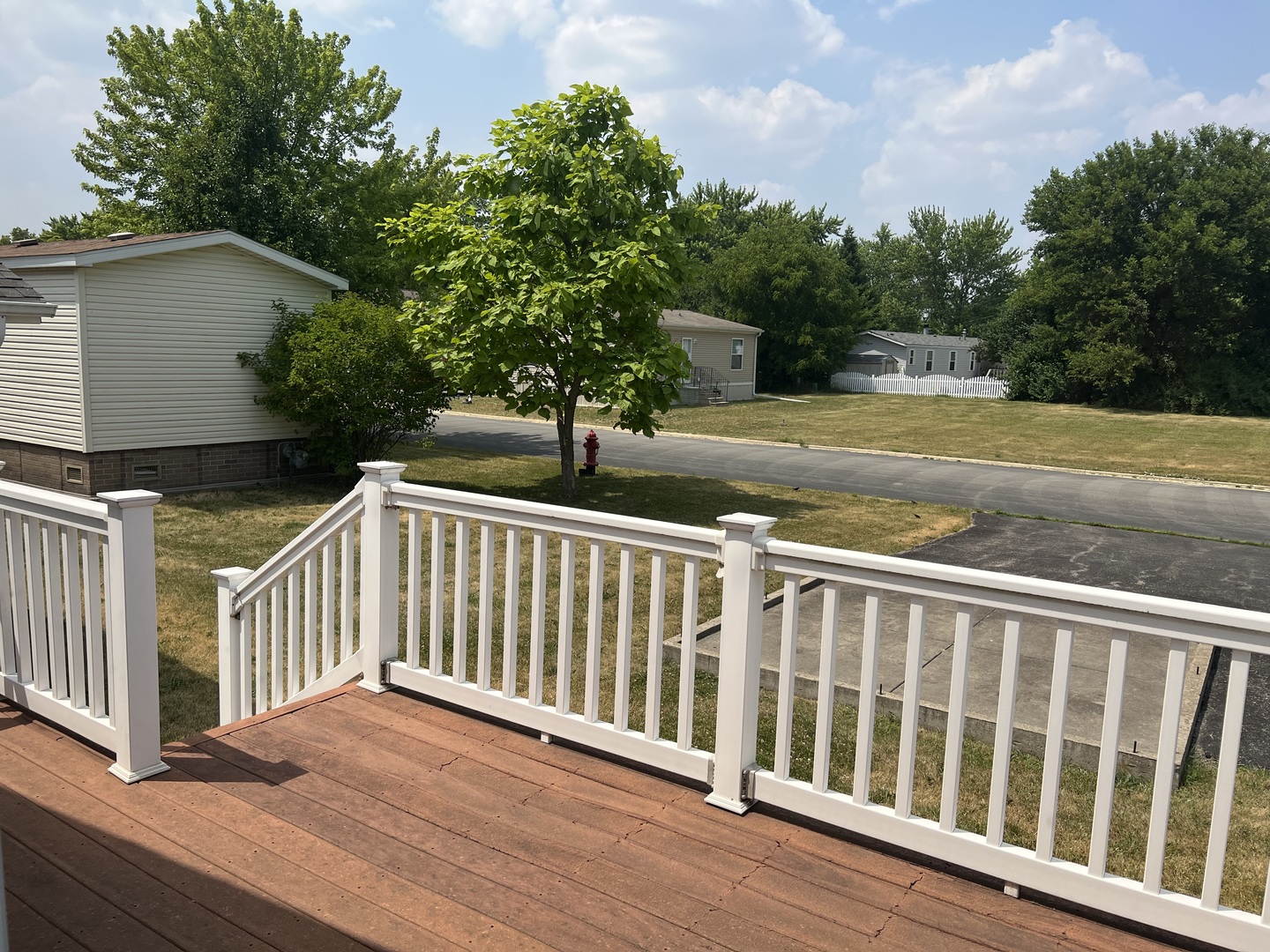 405 James Road Elwood, IL 60421 - Photo 9 of 27 a view of a wooden deck