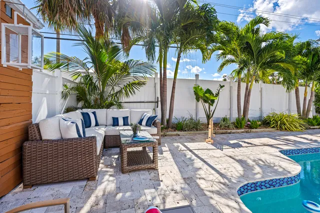 a view of living room with furniture and flat screen tv