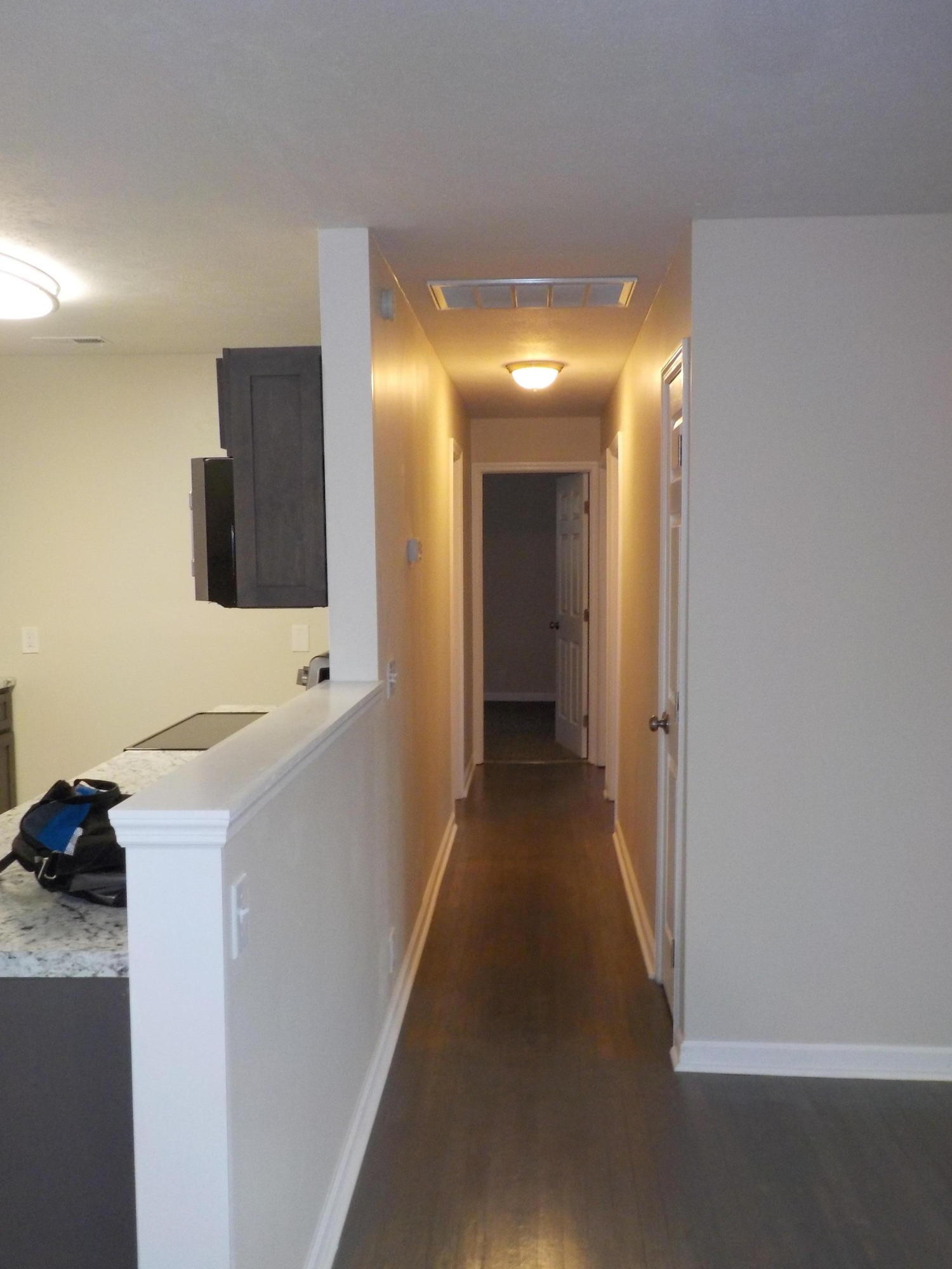 646 Edgemoor Road Powell, TN 37849 - Photo 6 of 22 a view of a hallway with workspace and a bathroom
