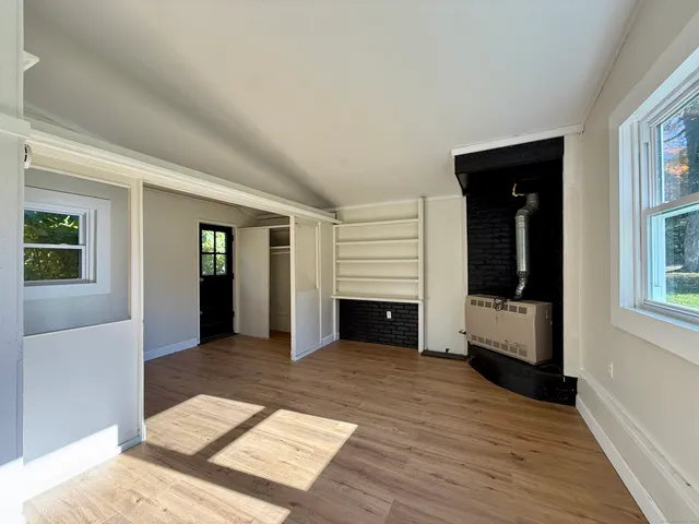 a view of a livingroom with a fireplace