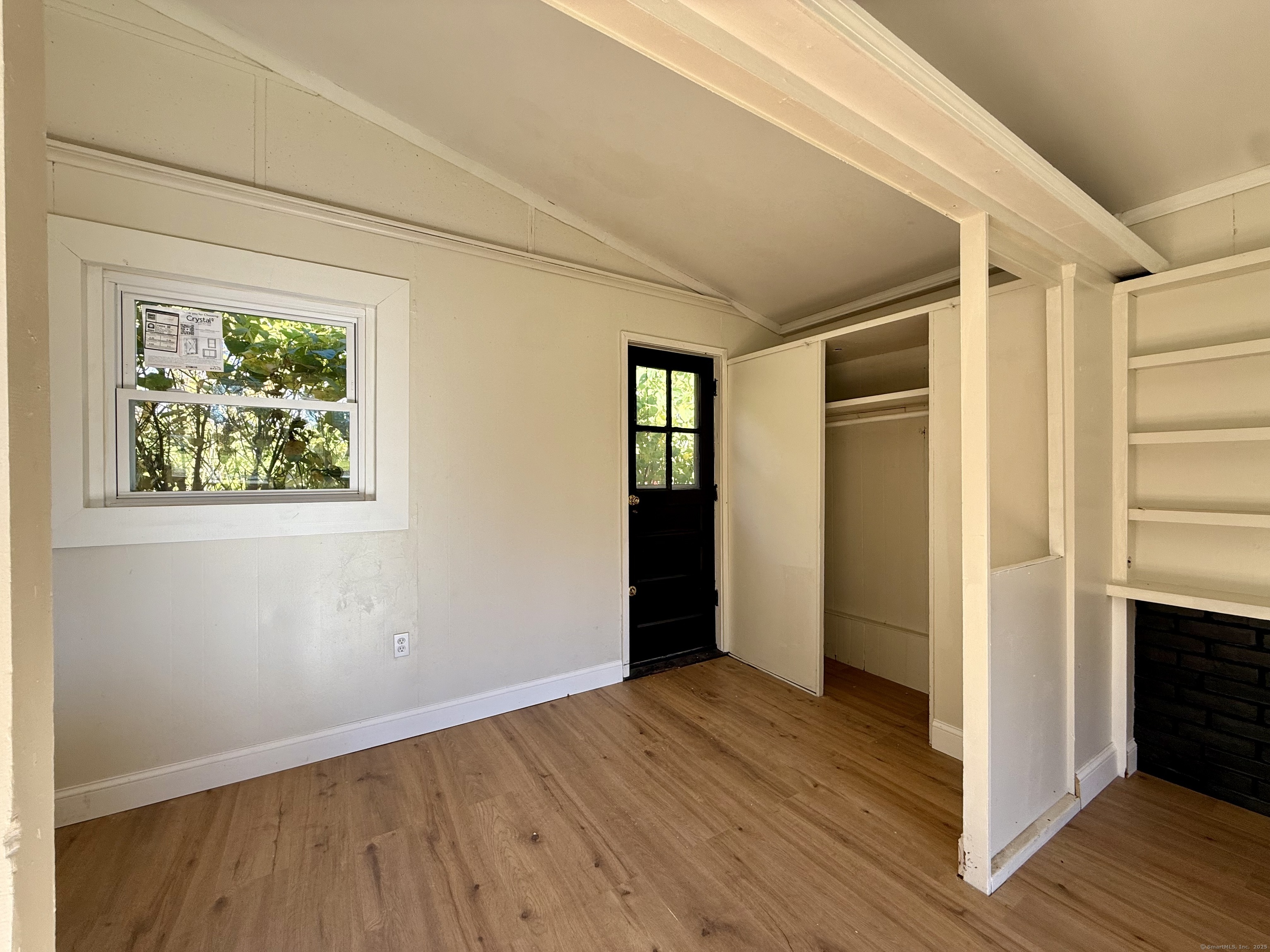 41 Waterbury Road, Unit B1 Prospect, CT 06712 - Photo 5 of 10 a view of hallway with wooden floor and stairs