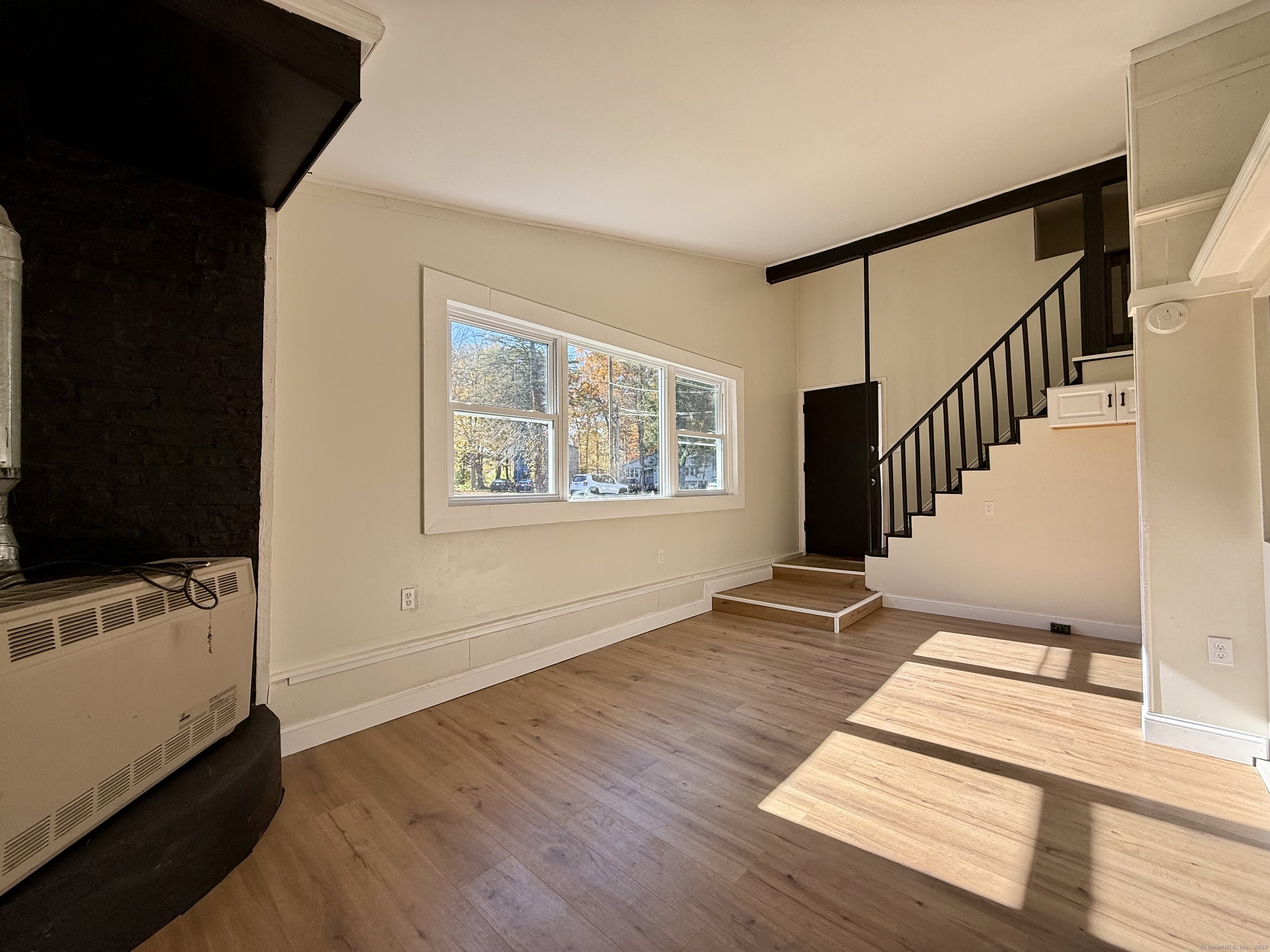 41 Waterbury Road, Unit B1 Prospect, CT 06712 - Photo 6 of 10 a view of an entryway with wooden floor and door