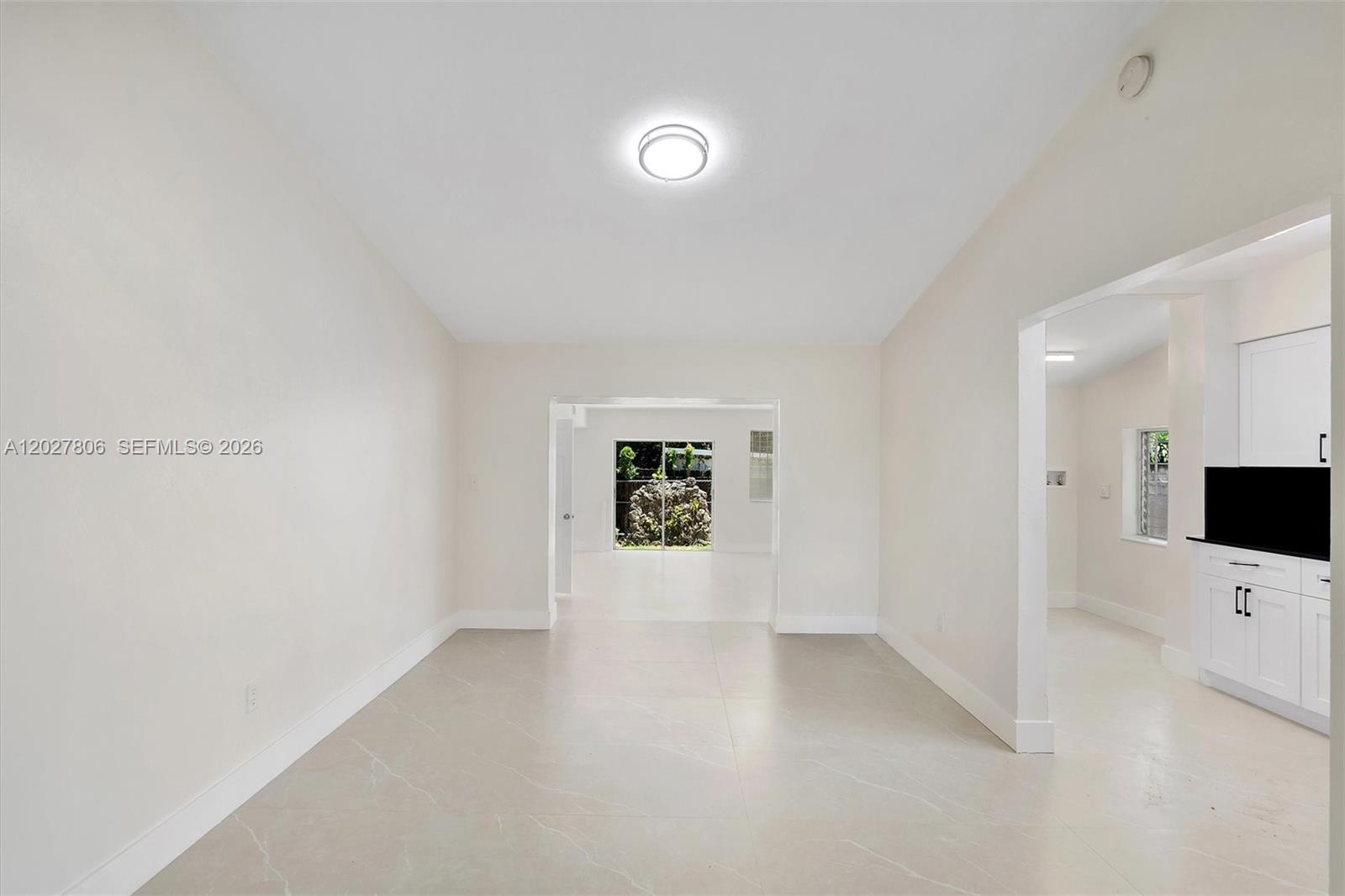 1612 Southwest 23rd Street, Unit 1612 Miami, FL 33145 - Photo 11 of 42 a view of entryway with wooden floor