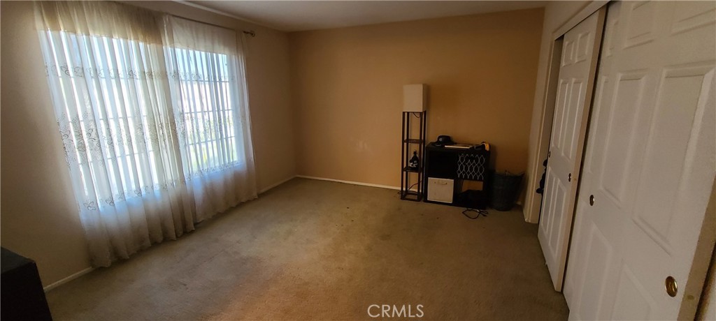 2563 Gilbert Avenue Corona, CA 92881 - Photo 12 of 21 a view of a room that has a window