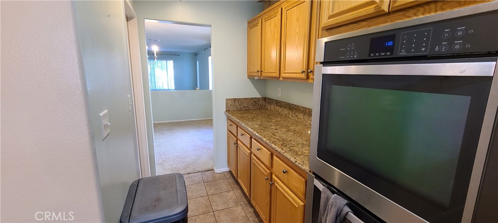 2563 Gilbert Avenue Corona, CA 92881 - Photo 6 of 21 a view of an entryway and kitchen