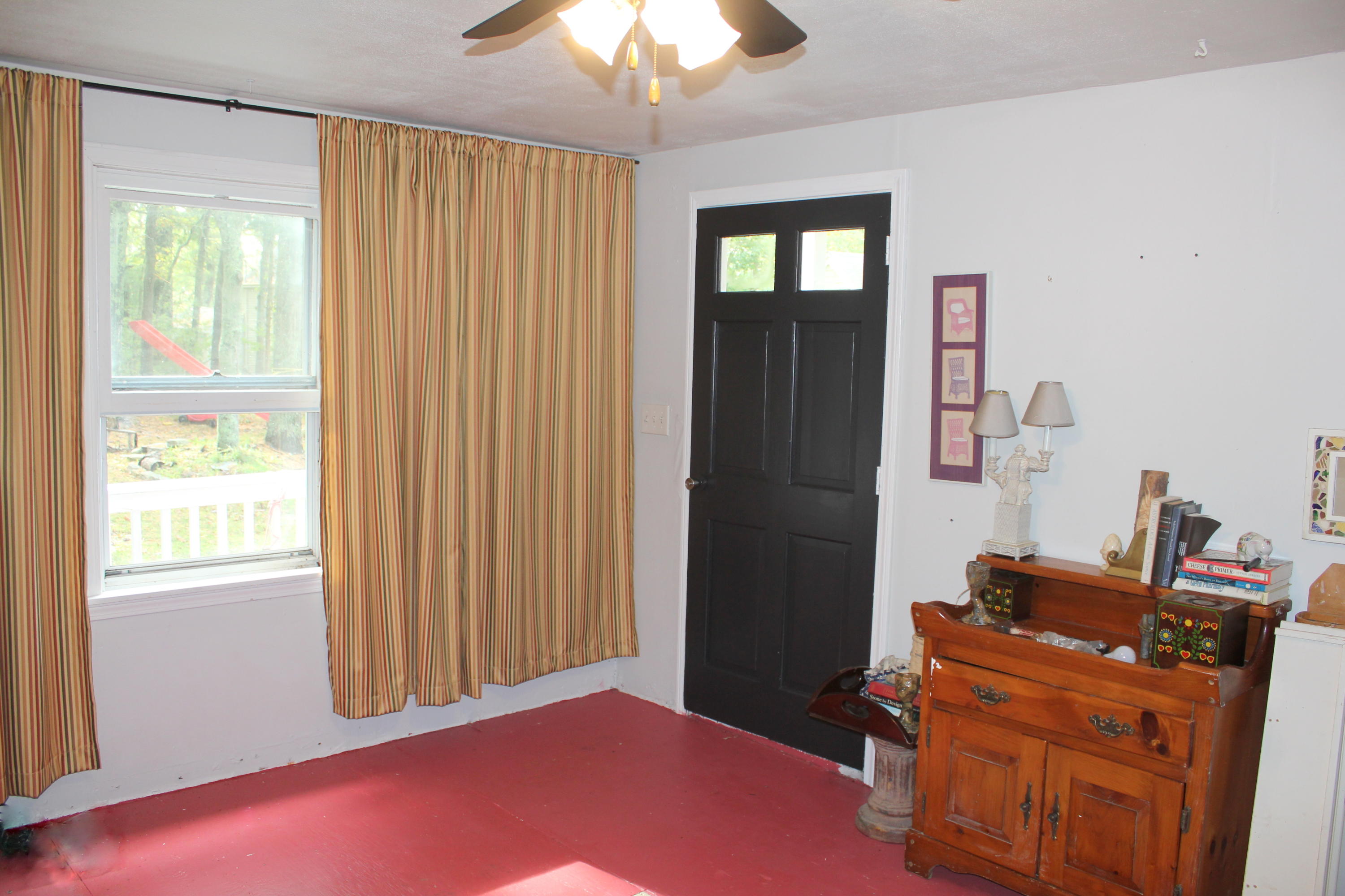 128 Turtleback Road Marstons Mills, MA 02648 - Photo 17 of 20 a bed room with a bed and a chandelier