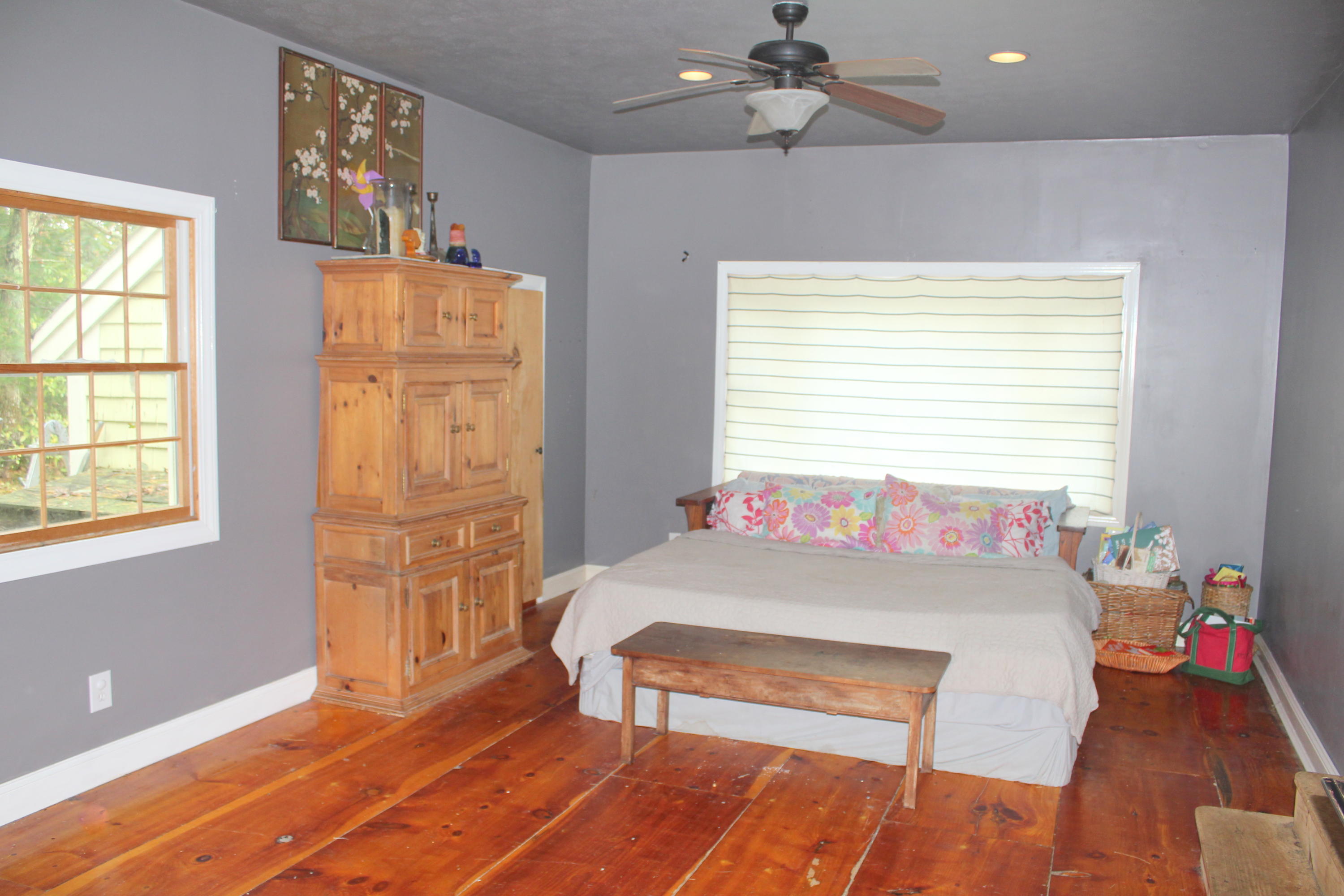 128 Turtleback Road Marstons Mills, MA 02648 - Photo 8 of 20 a bedroom with a bed and a table