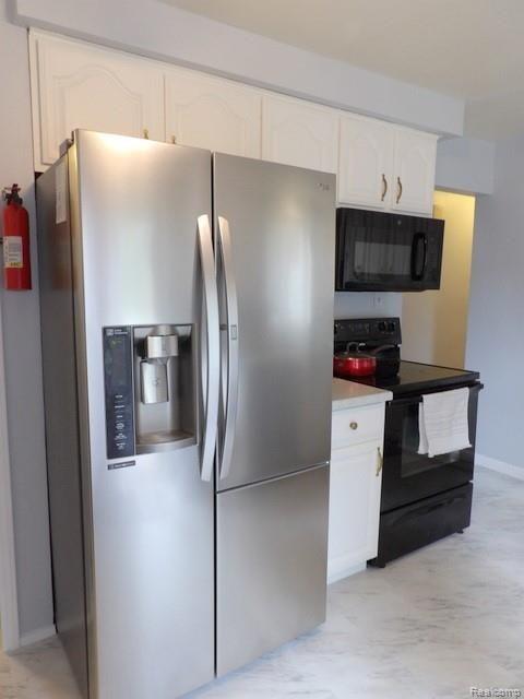 7911 Merrick Street Taylor, MI 48180 - Photo 22 of 42 22. STOVE AND NEW REFRIGERATOR WITH ICE MAKER AND WATER DISPENSER STAY TOO!