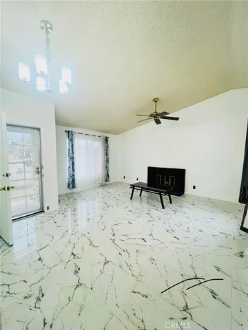 a view of a room with a wooden floor