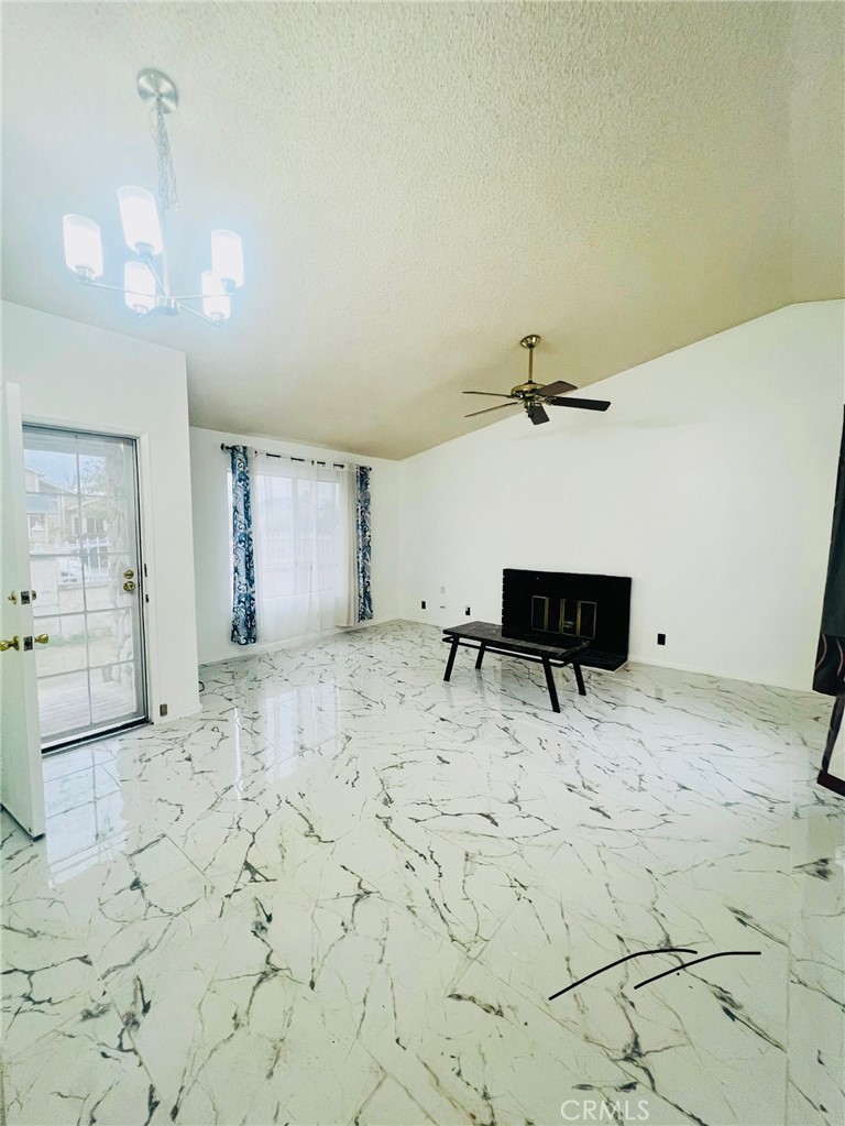 3607 Apollo Avenue Palmdale, CA 93550 - Photo 4 of 17 a view of a room with a wooden floor