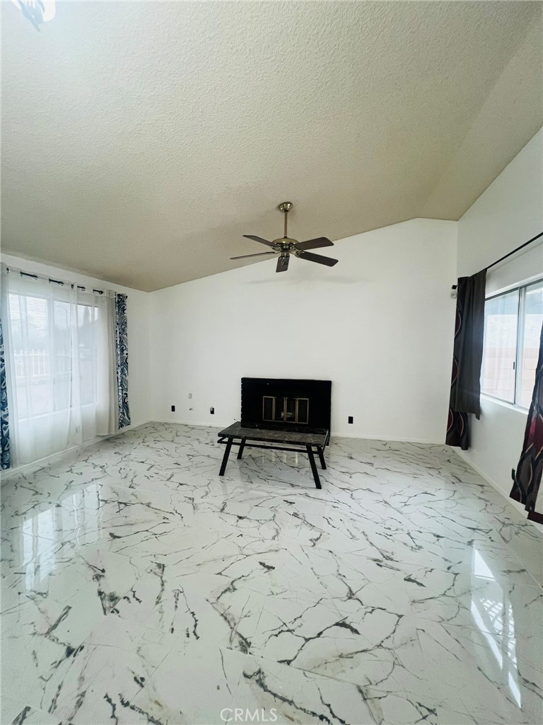 3607 Apollo Avenue Palmdale, CA 93550 - Photo 5 of 17 a view of a livingroom with wooden floor and a sink