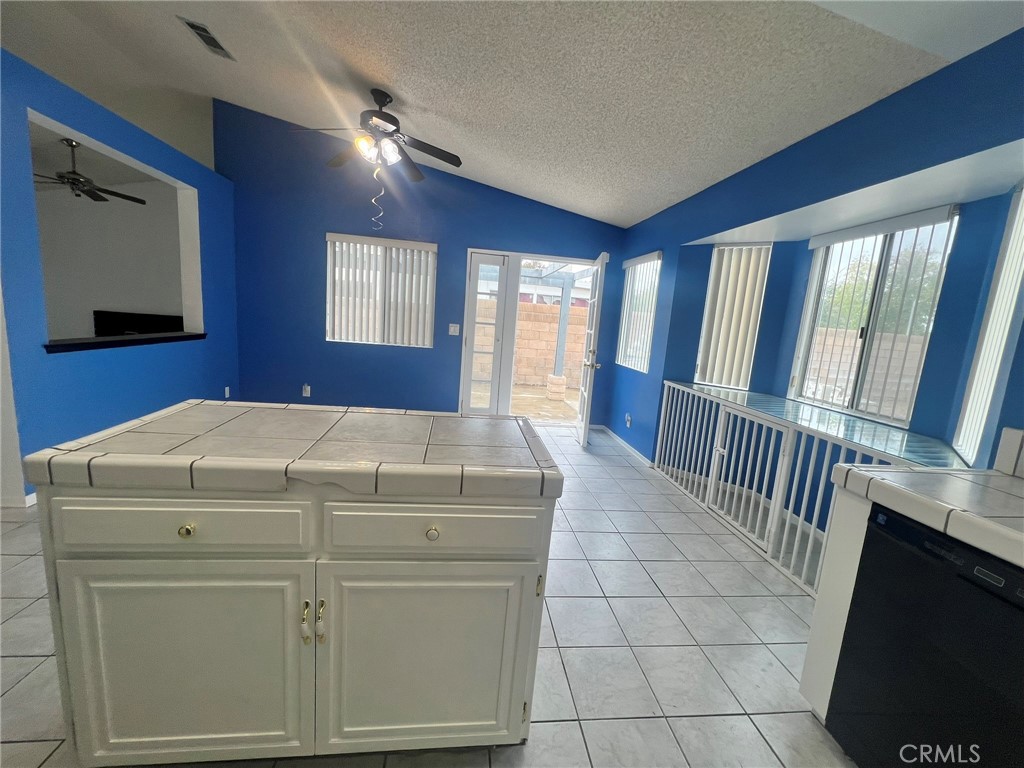 3607 Apollo Avenue Palmdale, CA 93550 - Photo 6 of 17 a bathroom with a sink a mirror and a bathtub