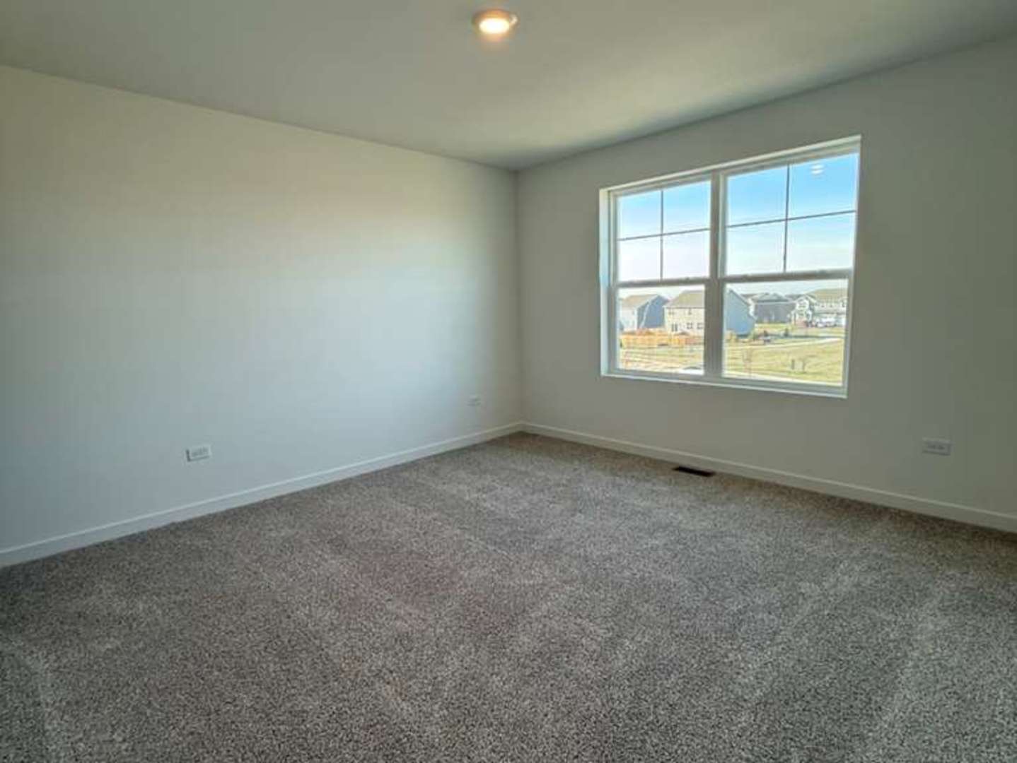 2251 Riesling Road Oswego, IL 60543 - Photo 7 of 13 an empty room with a window