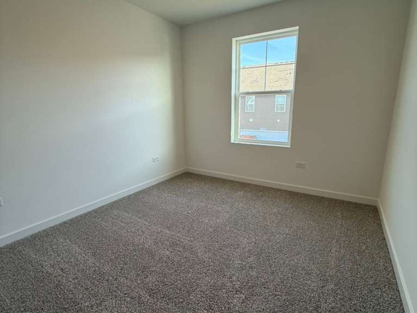 2251 Riesling Road Oswego, IL 60543 - Photo 8 of 13 an empty room with a window