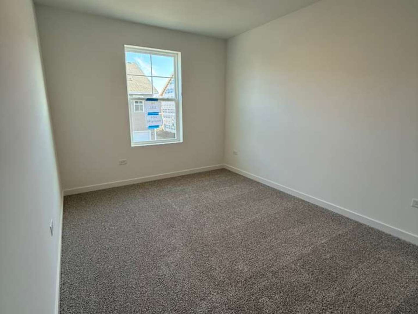 2251 Riesling Road Oswego, IL 60543 - Photo 9 of 13 an empty room with windows