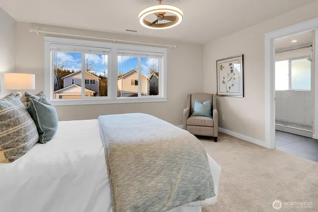 a bedroom with a bed and window