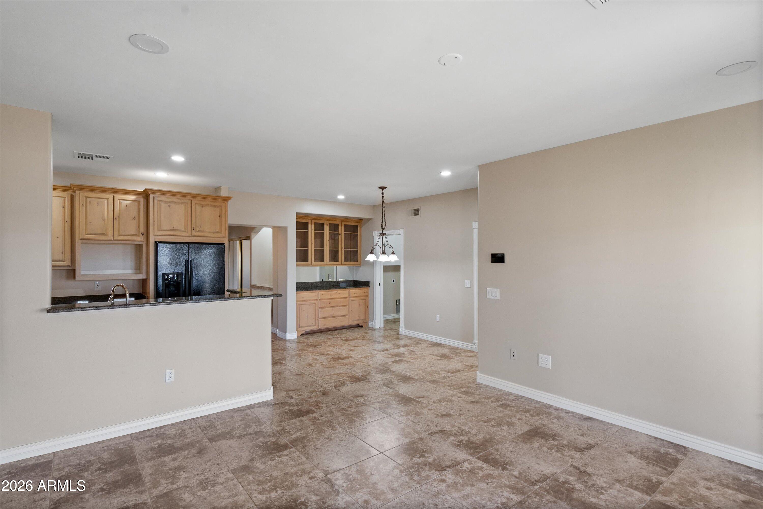619 East Briles Road Phoenix, AZ 85085 - Photo 64 of 107 064-Lower Unit Family to Kitchen