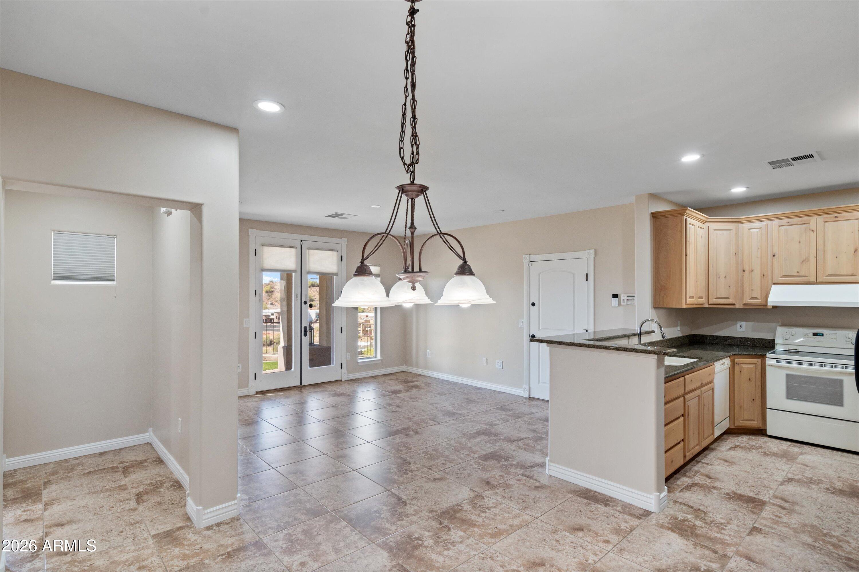 619 East Briles Road Phoenix, AZ 85085 - Photo 67 of 107 067-Lower Unit Dining to Family