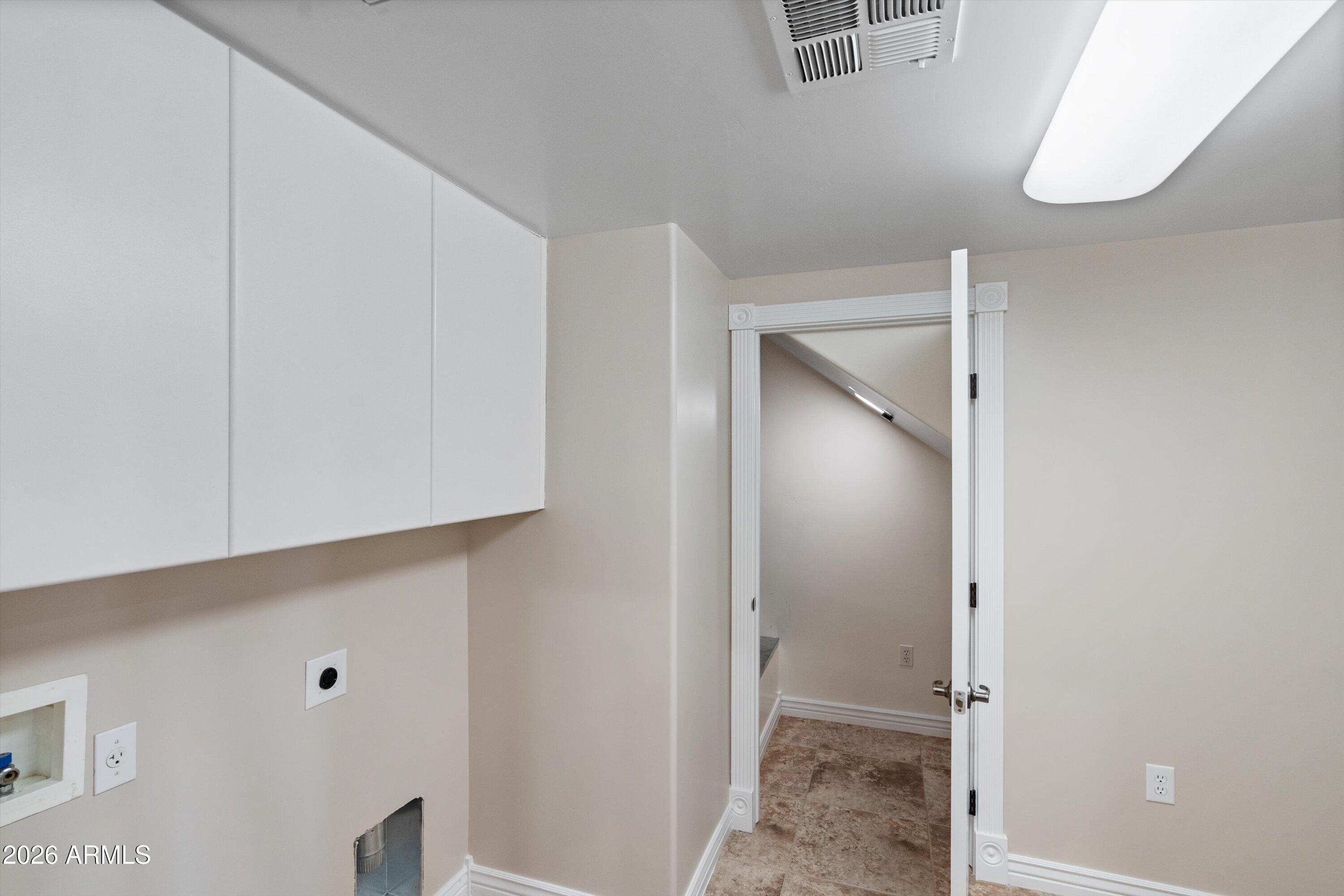 619 East Briles Road Phoenix, AZ 85085 - Photo 69 of 107 069-Lower Unit Laundry and Storage