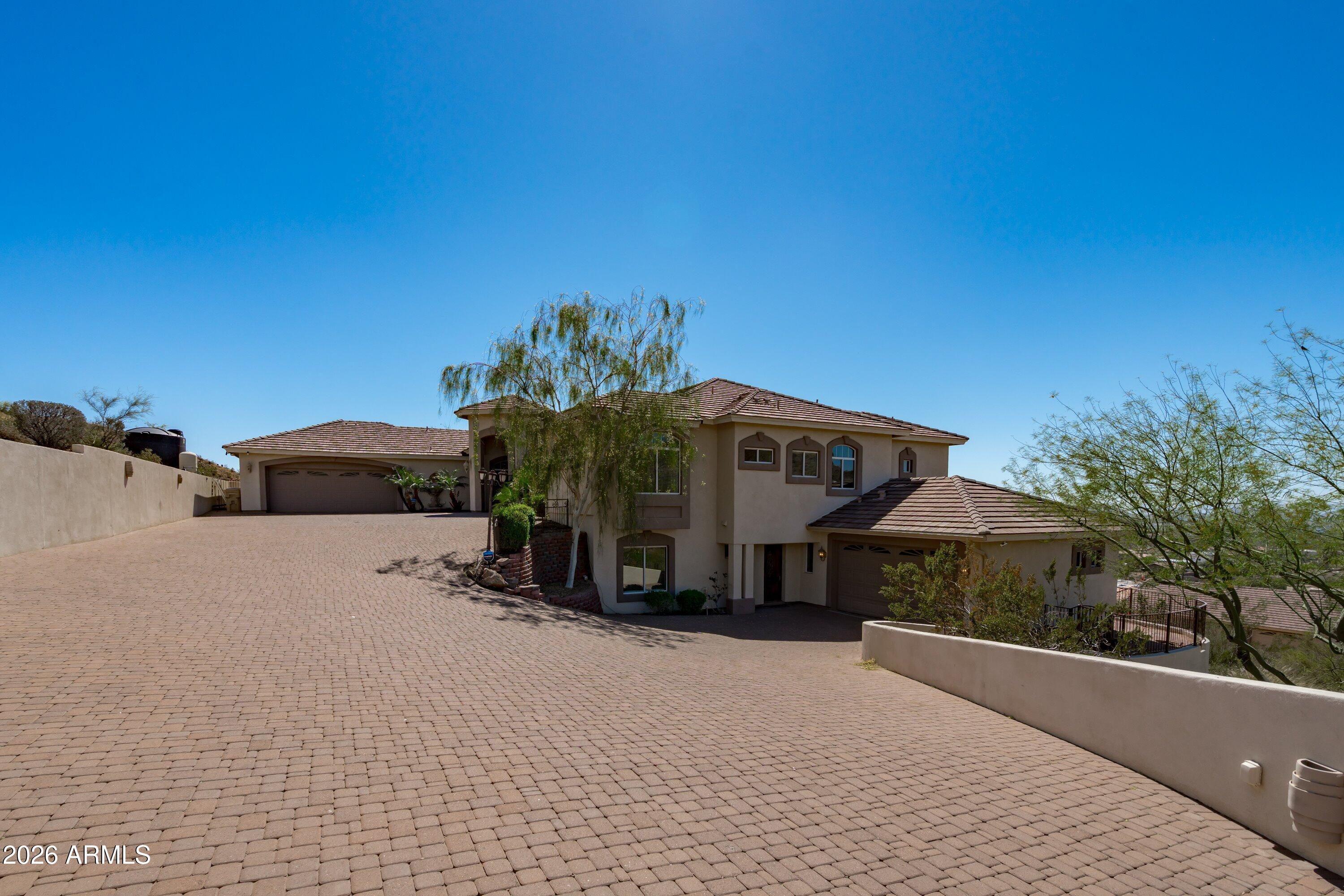 619 East Briles Road Phoenix, AZ 85085 - Photo 7 of 107 007-Driveway View and Lower Unit