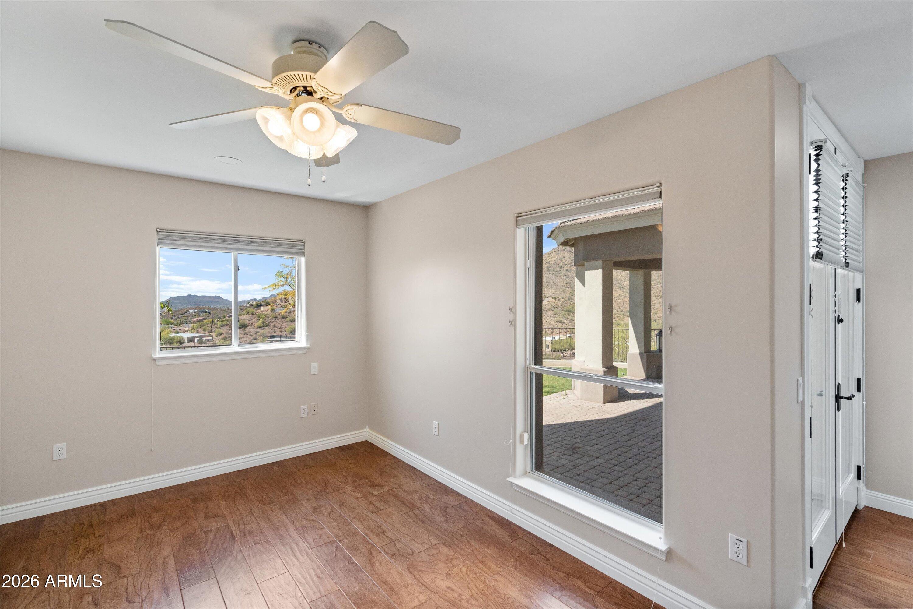 619 East Briles Road Phoenix, AZ 85085 - Photo 72 of 106 073-Lower Unit Primary Bedroom