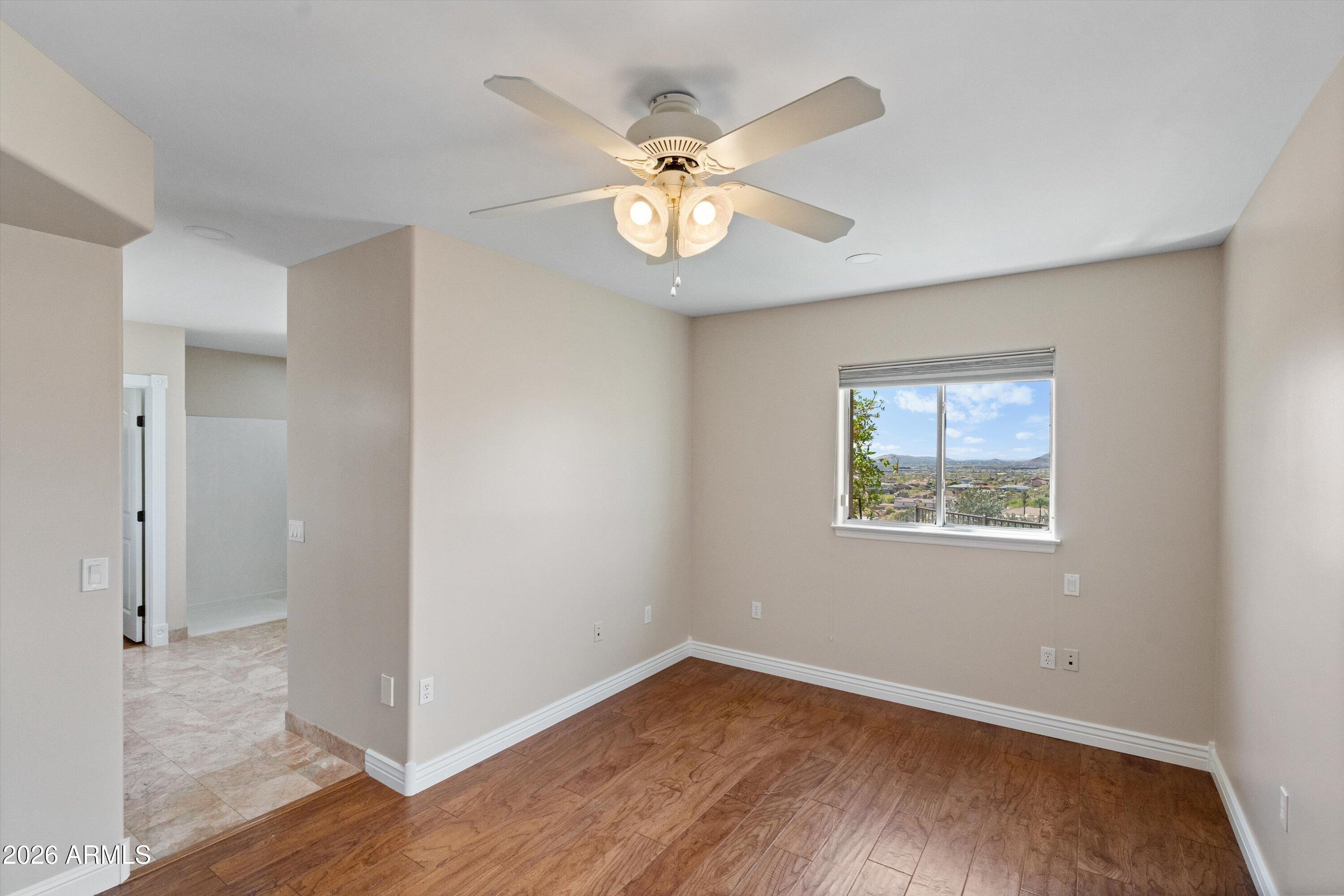 619 East Briles Road Phoenix, AZ 85085 - Photo 73 of 106 074-Lower Unit Primary Bedroom