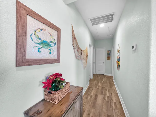 a bathroom with a tub shower and sink