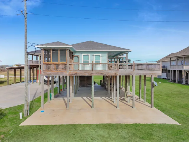 a front view of house with yard and seating area