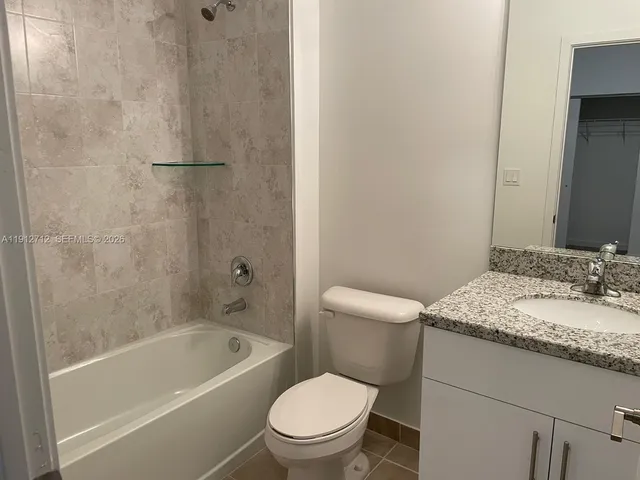 a view of hallway with a window