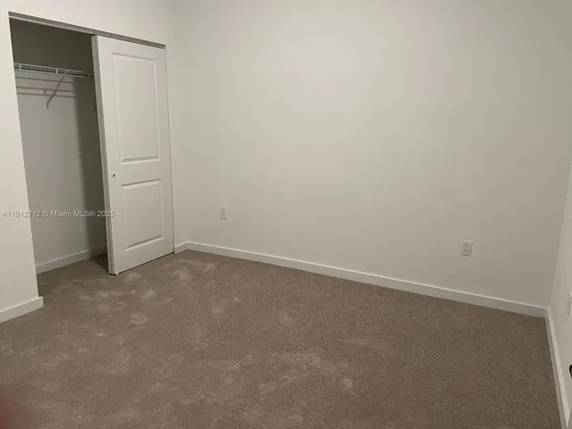 a view of hallway with a window