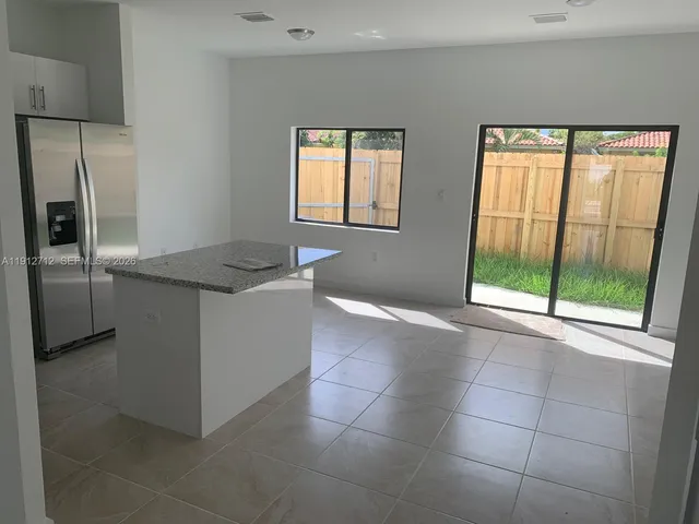 a bathroom with a shower and a toilet