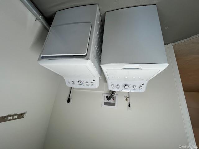 10 Inwood Road, Unit B Port Washington, NY 11050 - Photo 16 of 18 a utility room with dryer and washer