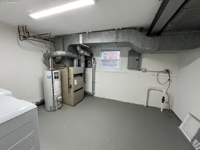 a utility room with cabinets