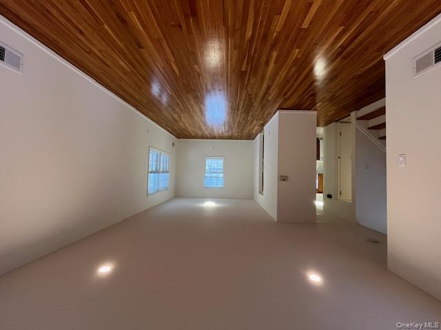 10 Inwood Road, Unit B Port Washington, NY 11050 - Photo 2 of 18 a view of empty room with wooden floor and fan