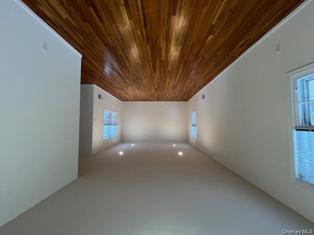 10 Inwood Road, Unit B Port Washington, NY 11050 - Photo 3 of 18 a view of empty room with wooden floor