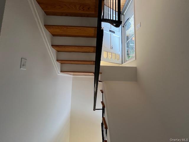 10 Inwood Road, Unit B Port Washington, NY 11050 - Photo 7 of 18 a view of entryway and hall