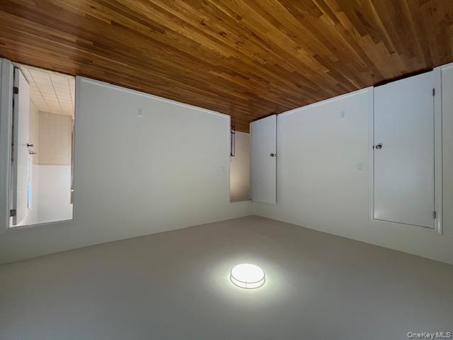 10 Inwood Road, Unit B Port Washington, NY 11050 - Photo 9 of 18 a view of empty room with wooden floor