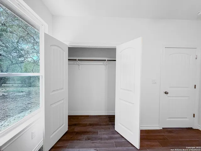 a view of small space with wooden floor