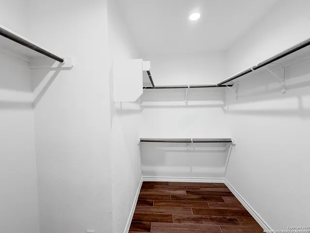 a view of a room with rack on the wall