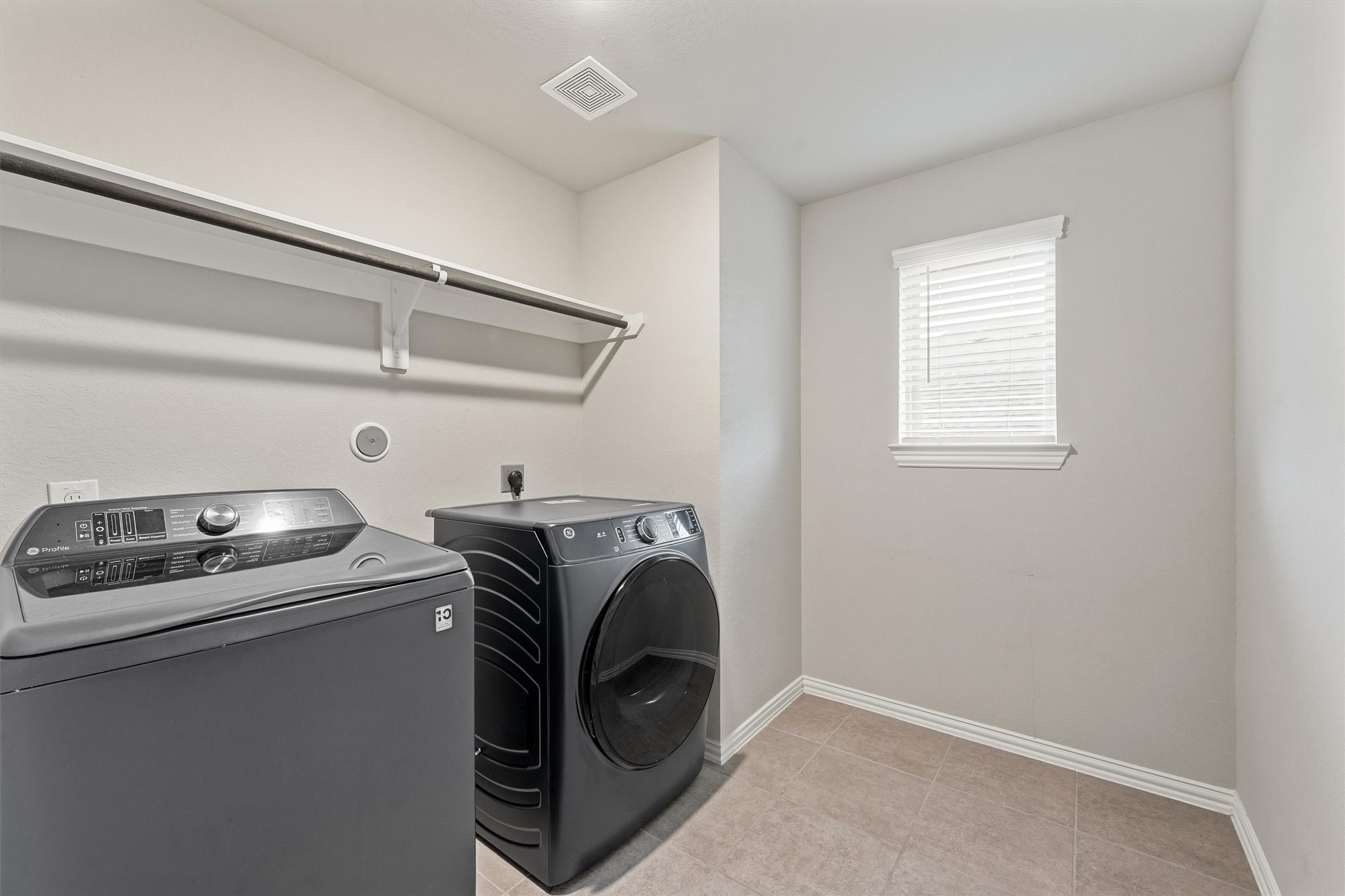 7119 Mystic Morning Lane Spring, TX 77379 - Photo 14 of 30 a utility room with dryer and washer